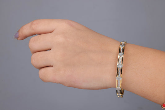 A woman's arm with a bracelet on it