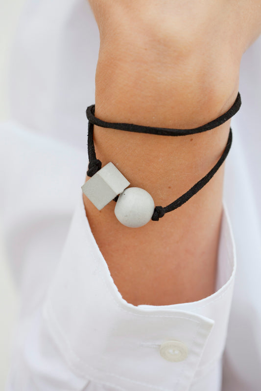 A close up of a person wearing a bracelet