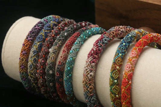Colorful beaded bracelets arranged in a row