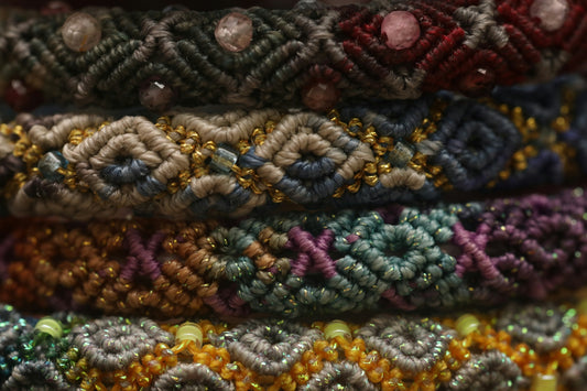 Stack of colorful, beaded friendship bracelets