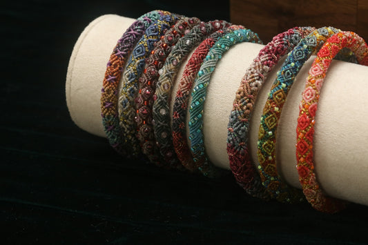 A collection of colorful beaded bracelets displayed