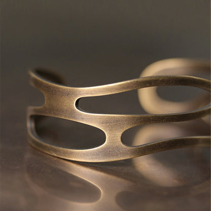 Brazalete ajustable de cobre y latón con piedras de Buda, estilo vintage, curvado y con símbolo de riqueza