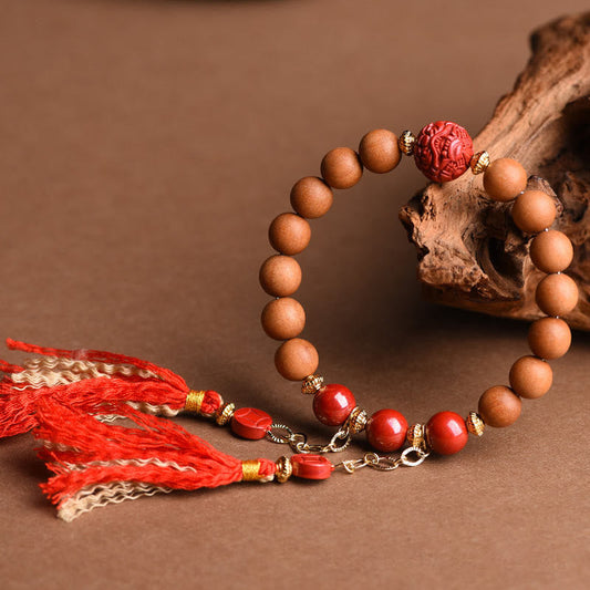 Pulsera de borlas de PiXiu con piedras de Buda tibetanas de madera de melocotón natural y cinabrio 