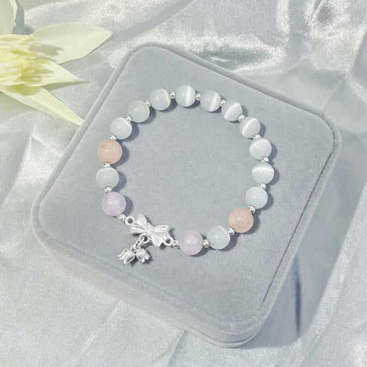 Pulsera con dije de roseta de amatista y lavanda con ojo de gato y piedras de Buda