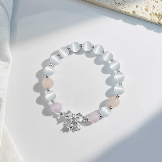 Pulsera con dije de roseta de amatista y lavanda con ojo de gato y piedras de Buda