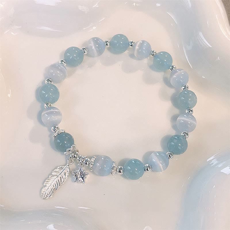 Pulsera con dije de estrella y pluma curativa de ojo de gato y aguamarina en plata de ley 925 con piedras de Buda 