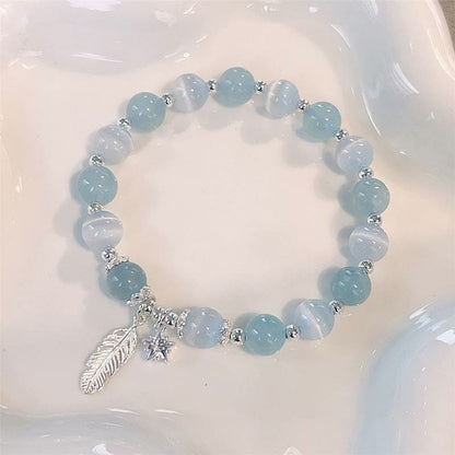 Pulsera con dije de estrella y pluma curativa de ojo de gato y aguamarina en plata de ley 925 con piedras de Buda 