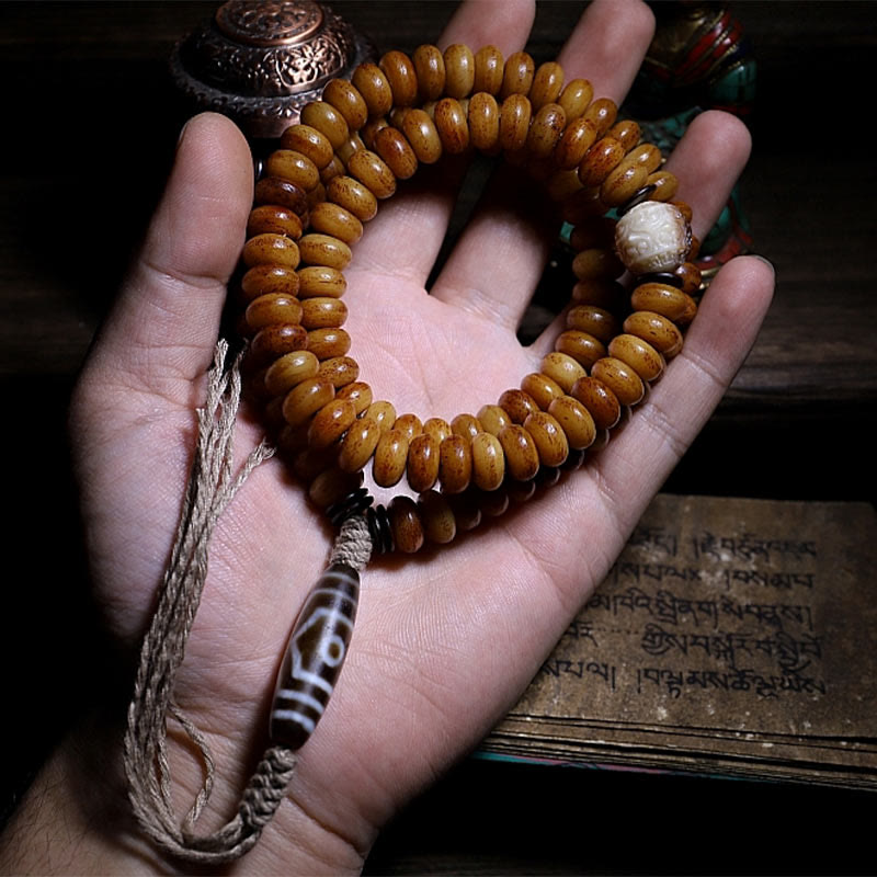 Pulsera tibetana de 108 cuentas Mala de hueso de yak con tres ojos de Dzi y piedras de Buda para alejar los malos espíritus.
