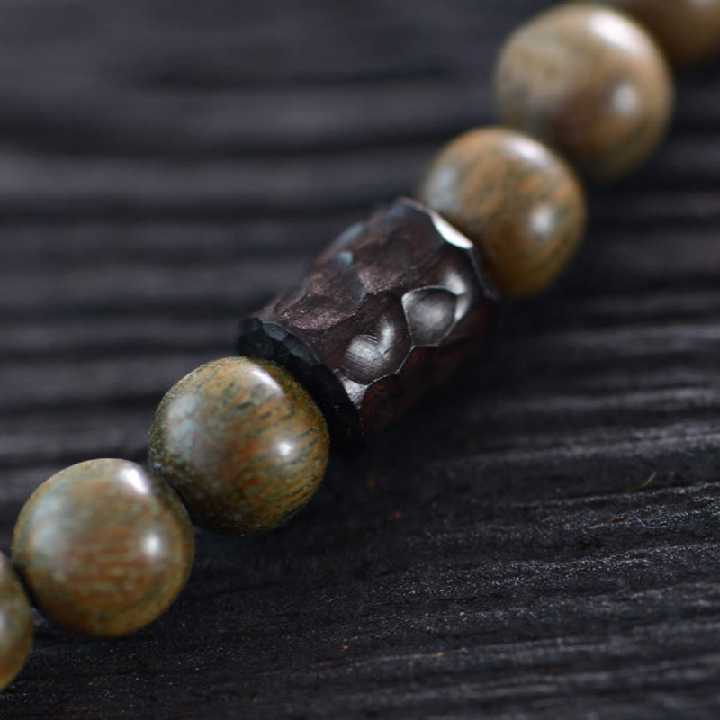 Pulsera de doble vuelta con cuentas Dzi de tres ojos de madera de ébano y sándalo verde tibetano con piedras de Buda y carácter Fu, equilibrio y paz.