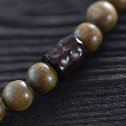 Pulsera de doble vuelta con cuentas Dzi de tres ojos de madera de ébano y sándalo verde tibetano con piedras de Buda y carácter Fu, equilibrio y paz.