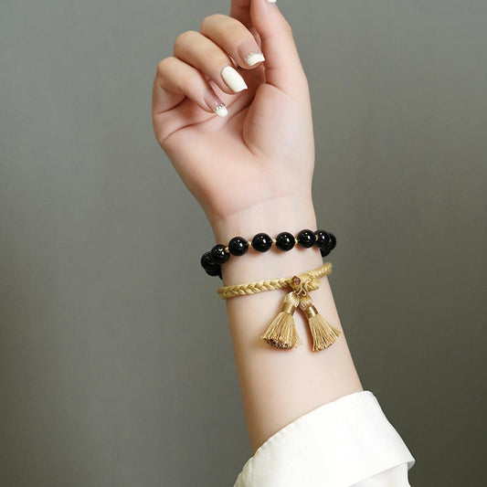 Pulsera de hilo protector con cuentas de ónix negro de Buddha Stones (2 unidades)