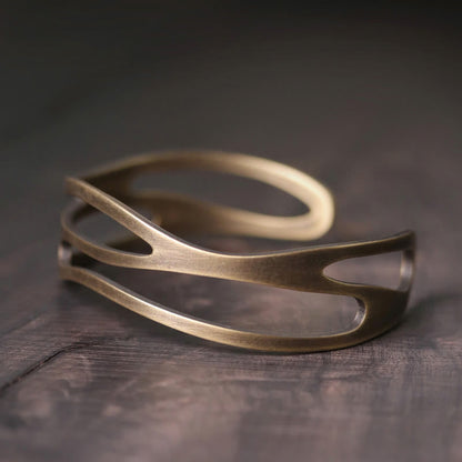 Brazalete ajustable de cobre y latón con piedras de Buda, estilo vintage, curvado y con símbolo de riqueza