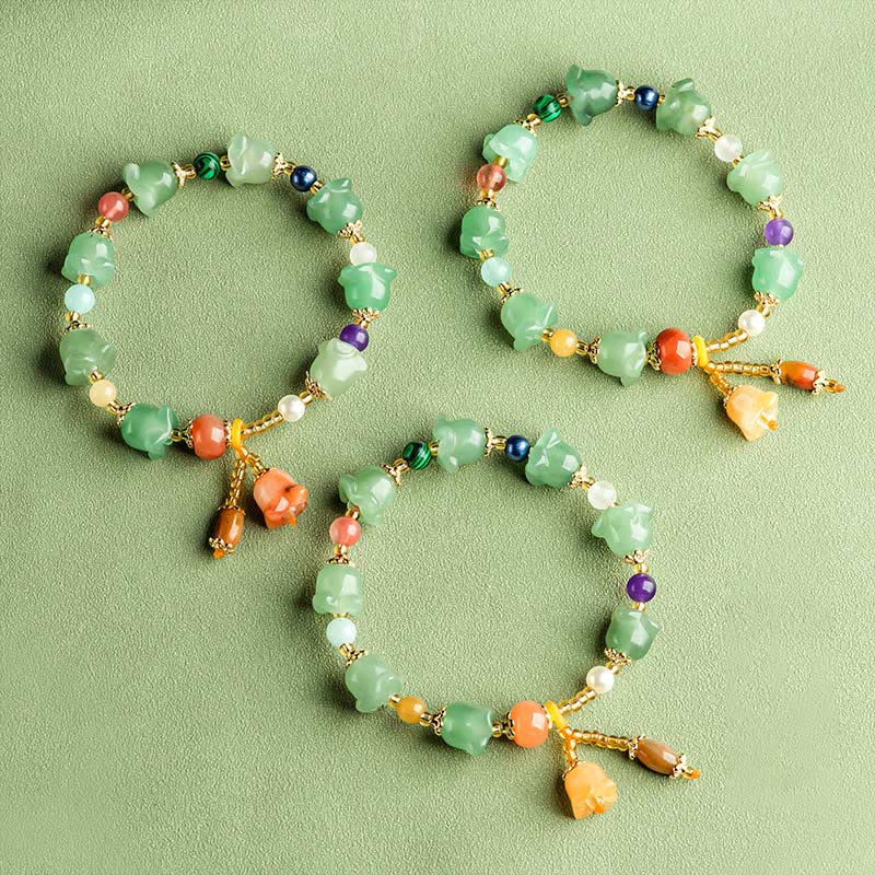 Pulsera de la suerte con flor de magnolia y aventurina verde de Buddha Stones 