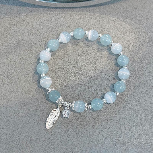 Pulsera con dije de estrella y pluma curativa de ojo de gato y aguamarina en plata de ley 925 con piedras de Buda 