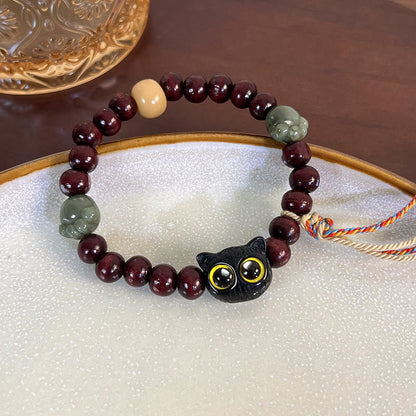 Pulsera de madera con borlas de la paz, con piedras de Buda, madera de ébano y pata de jade de gato encantador 
