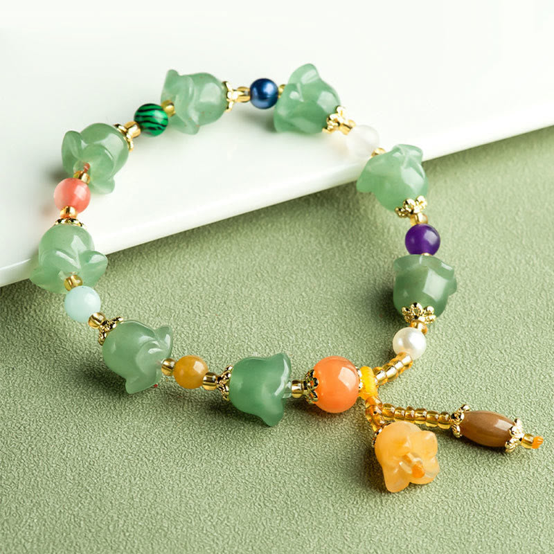 Pulsera de la suerte con flor de magnolia y aventurina verde de Buddha Stones 