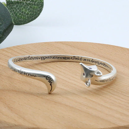 Brazalete de cobre con piedras de Buda y grabado de zorro