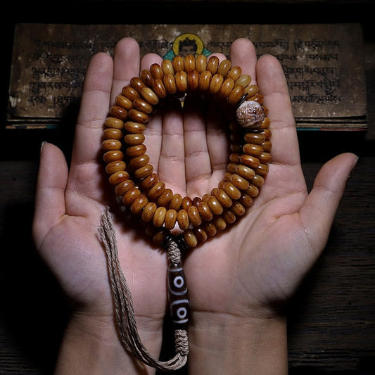 Pulsera tibetana de 108 cuentas Mala de hueso de yak con tres ojos de Dzi y piedras de Buda para alejar los malos espíritus.
