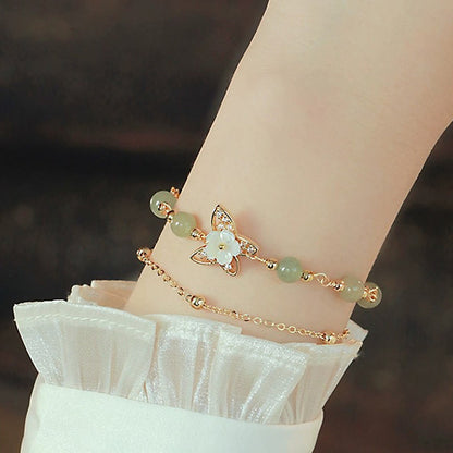 Pulsera de la suerte de doble capa con piedras de Buda, chapada en oro de 14 quilates, jade, mariposa, piedra tridacna y flor