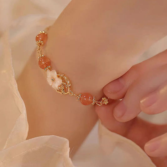 Pulsera de confianza con flor de piedra Tridacna y ágata roja de Buddha Stones
