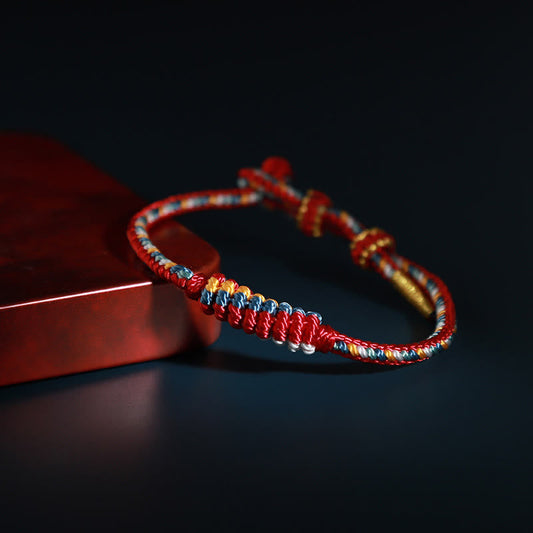 Pulsera trenzada de protección con ocho hilos y nudo de la paz tibetano, hecha a mano, con piedras de Buda 