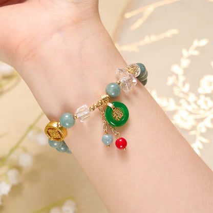 Pulsera curativa con dijes de jade fu y cuarzo fresa de Buda