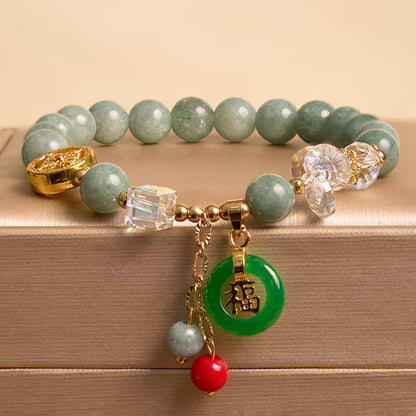 Pulsera curativa con dijes de jade fu y cuarzo fresa de Buda