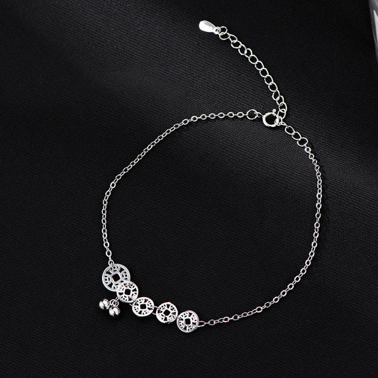 Tobillera de metal con piedras de Buda, monedas de cobre, campanas y protección en plata de ley 925