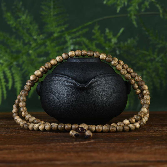 Pulsera de madera de agar Hoi An con 108 cuentas de mala de Buda que ahuyenta los malos espíritus