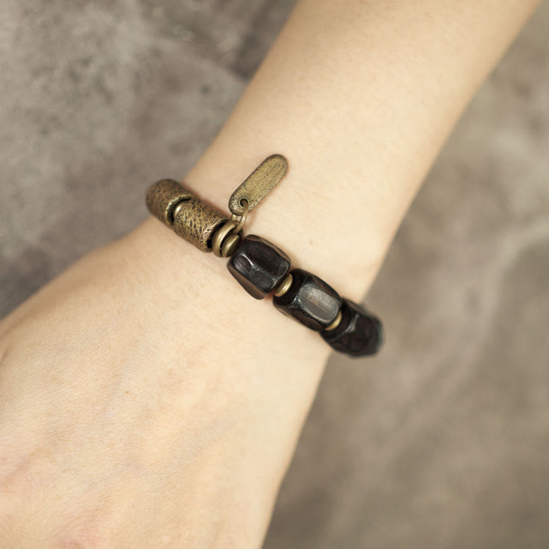 Pulsera de cuentas de cobre y madera de ébano con piedras de Buda de la paz vintage 