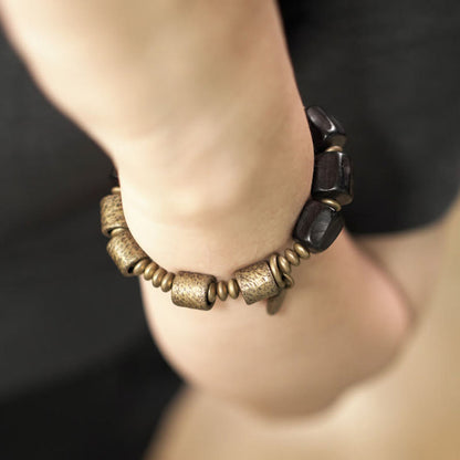 Pulsera de cuentas de cobre y madera de ébano con piedras de Buda de la paz vintage 