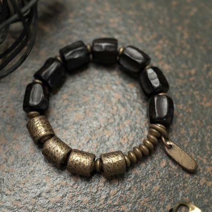 Pulsera de cuentas de cobre y madera de ébano con piedras de Buda de la paz vintage 