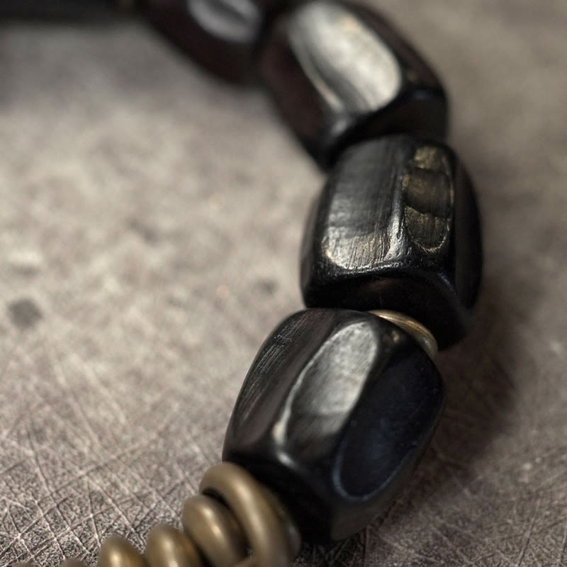 Pulsera de cuentas de cobre y madera de ébano con piedras de Buda de la paz vintage 