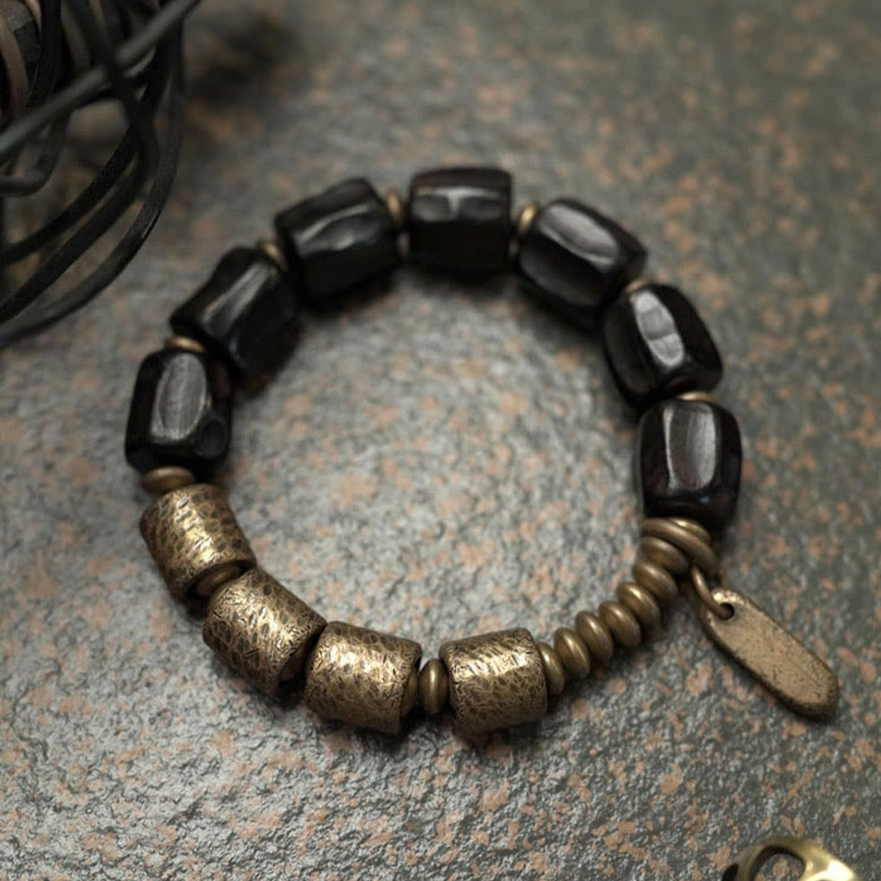 Pulsera de cuentas de cobre y madera de ébano con piedras de Buda de la paz vintage 