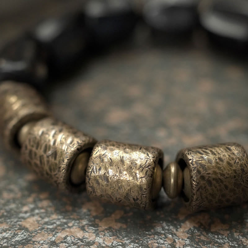 Pulsera de cuentas de cobre y madera de ébano con piedras de Buda de la paz vintage 