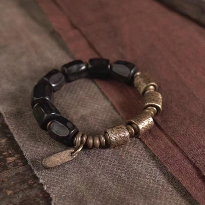 Pulsera de cuentas de cobre y madera de ébano con piedras de Buda de la paz vintage 