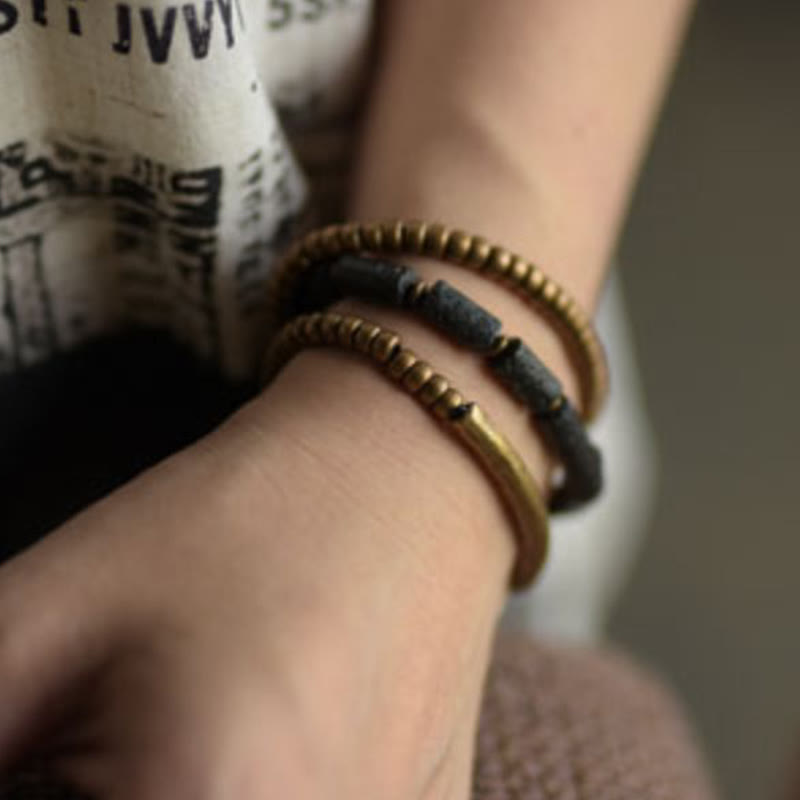 Pulsera multicapa con cuentas de cobre y roca volcánica vintage de Buddha Stones