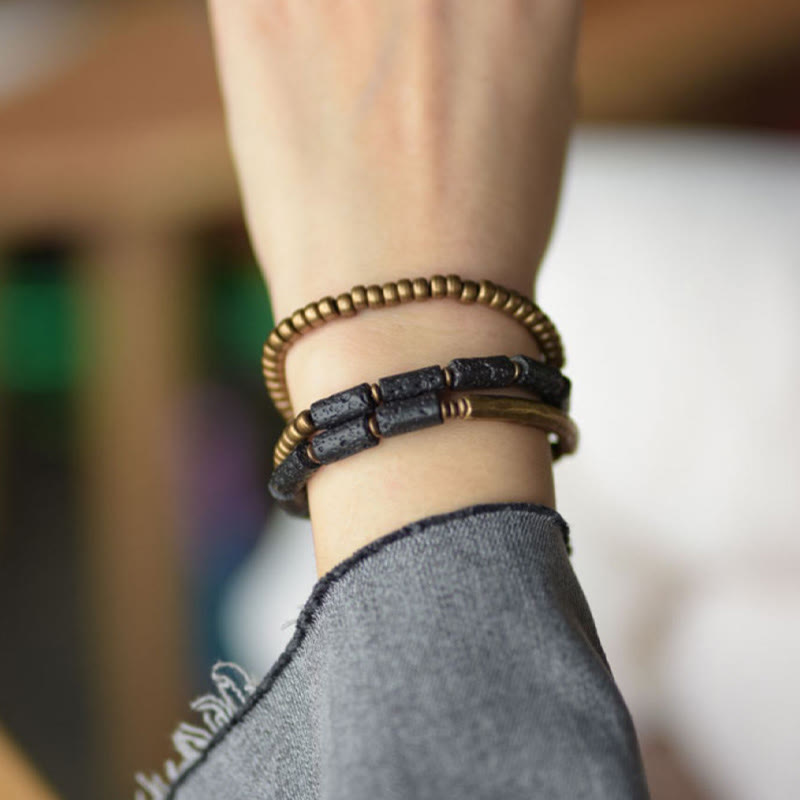 Pulsera multicapa con cuentas de cobre y roca volcánica vintage de Buddha Stones