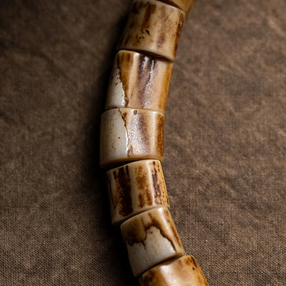Pulsera de la sabiduría tallada con calavera de hueso de yak y hueso de ciervo tibetano de Buda