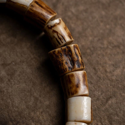 Pulsera de la sabiduría tallada con calavera de hueso de yak y hueso de ciervo tibetano de Buda