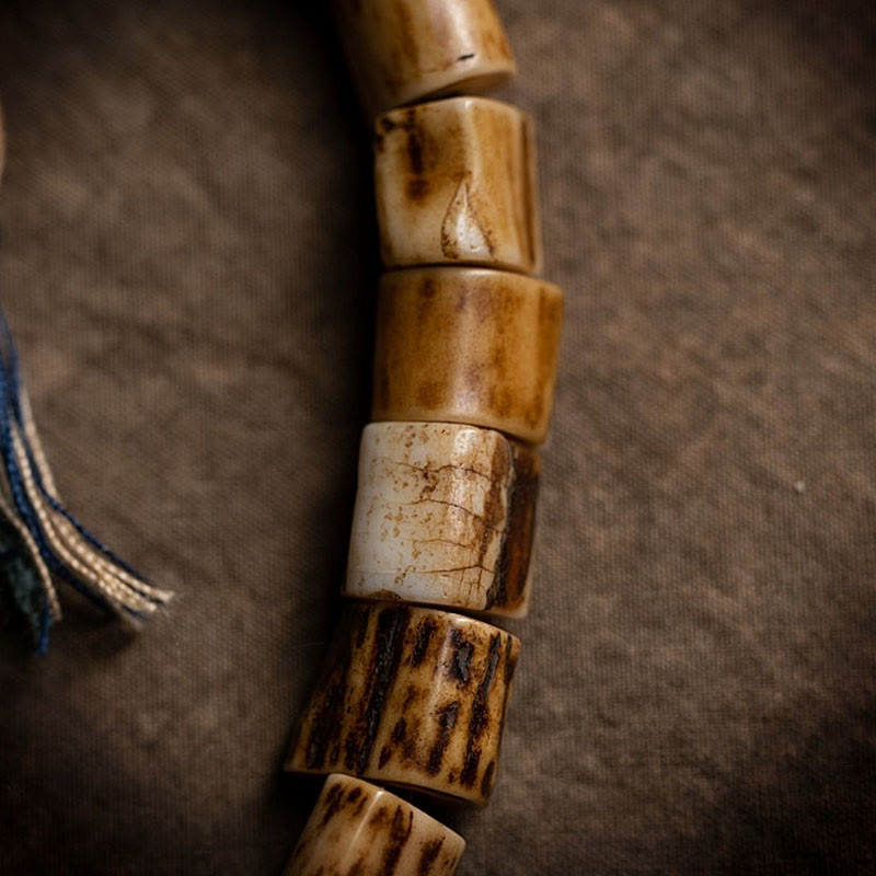 Pulsera de la sabiduría tallada con calavera de hueso de yak y hueso de ciervo tibetano de Buda