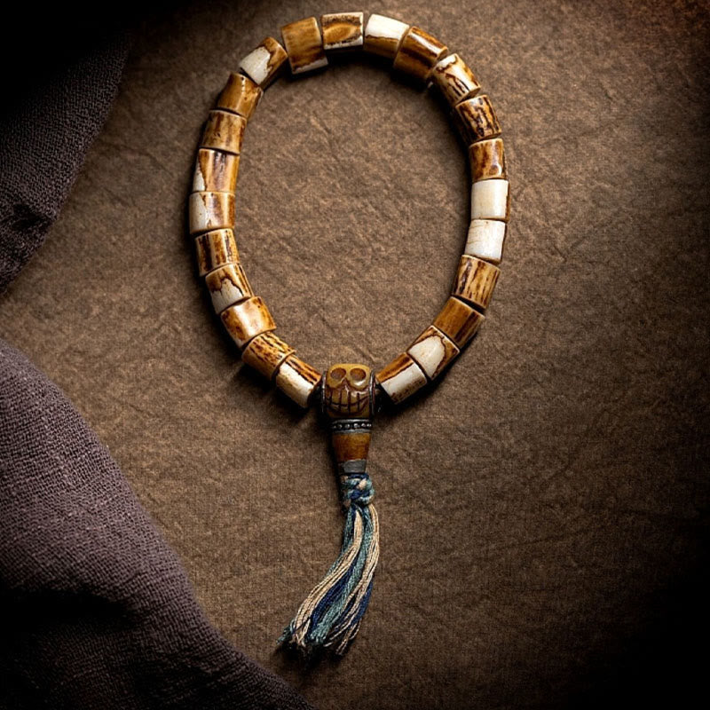 Pulsera de la sabiduría tallada con calavera de hueso de yak y hueso de ciervo tibetano de Buda