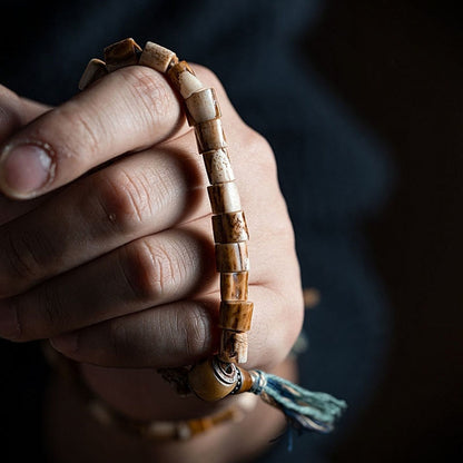 Pulsera de la sabiduría tallada con calavera de hueso de yak y hueso de ciervo tibetano de Buda