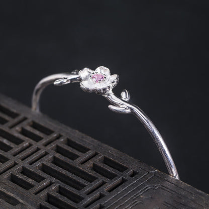 Pulsera de la suerte con piedras de Buda en plata de ley 925 y flor de cerezo