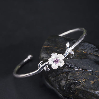 Pulsera de la suerte con piedras de Buda en plata de ley 925 y flor de cerezo