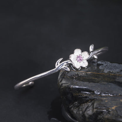 Pulsera de la suerte con piedras de Buda en plata de ley 925 y flor de cerezo