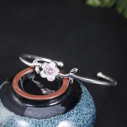 Pulsera de la suerte con piedras de Buda en plata de ley 925 y flor de cerezo