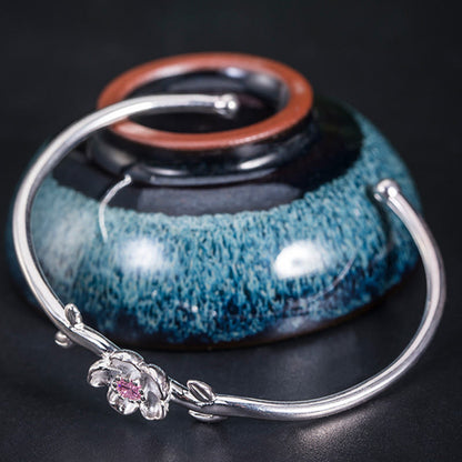 Pulsera de la suerte con piedras de Buda en plata de ley 925 y flor de cerezo