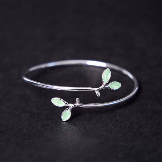 Brazalete de soporte con diseño de ojo de gato y hojas de piedras de Buda