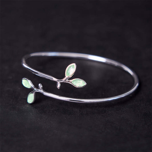 Brazalete de soporte con diseño de ojo de gato y hojas de piedras de Buda